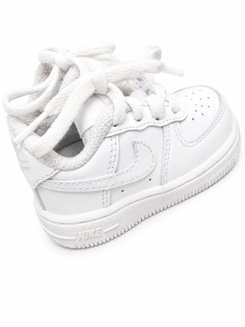Kids White AIRFORCE ONES. NIKE -
